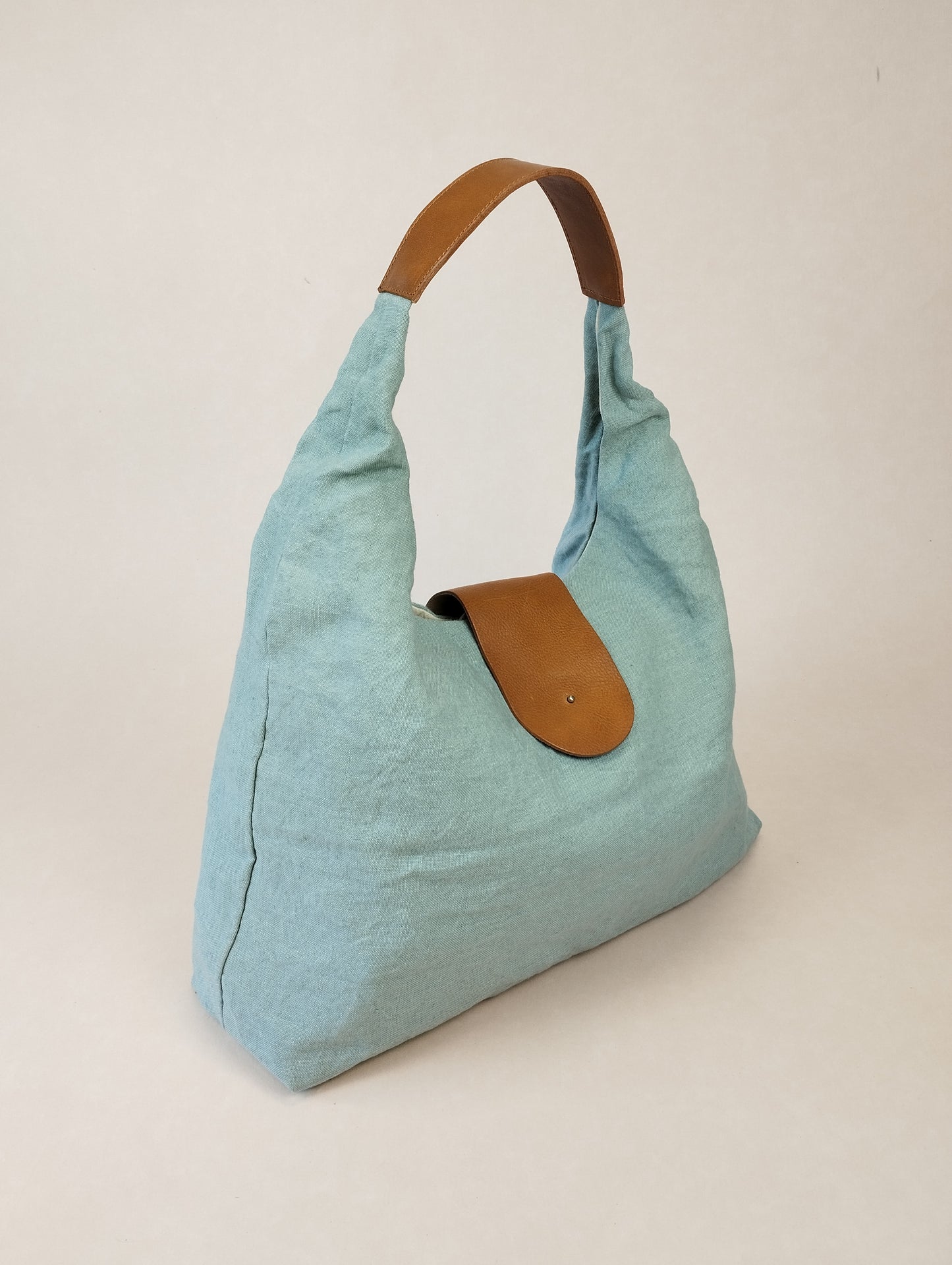 BOLSO SICILIA AZUL ASAS COLOR CAMEL
