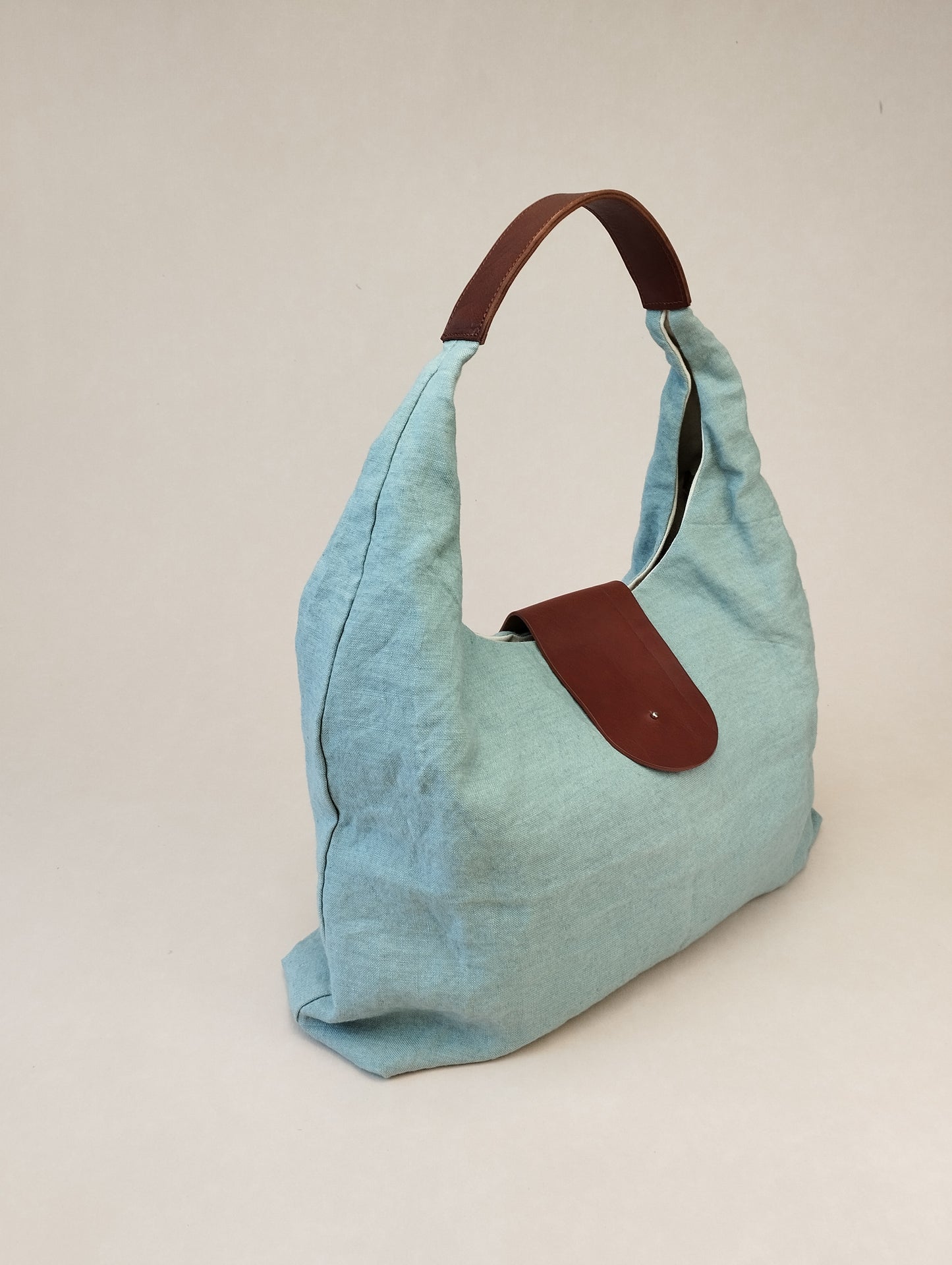 BOLSO SICILIA AZUL ASAS COLOR HIERRO