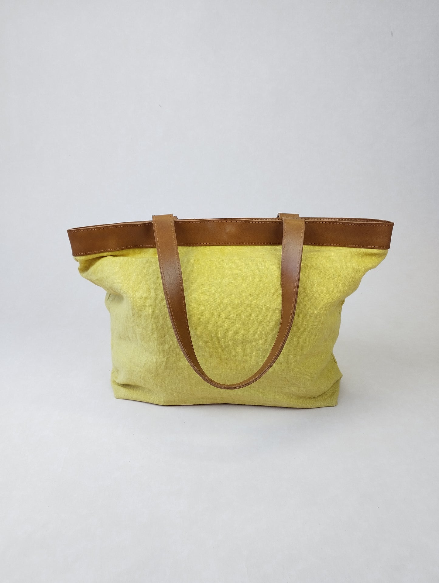 BOLSO ROMA AMARILLO ASAS COLOR CAMEL