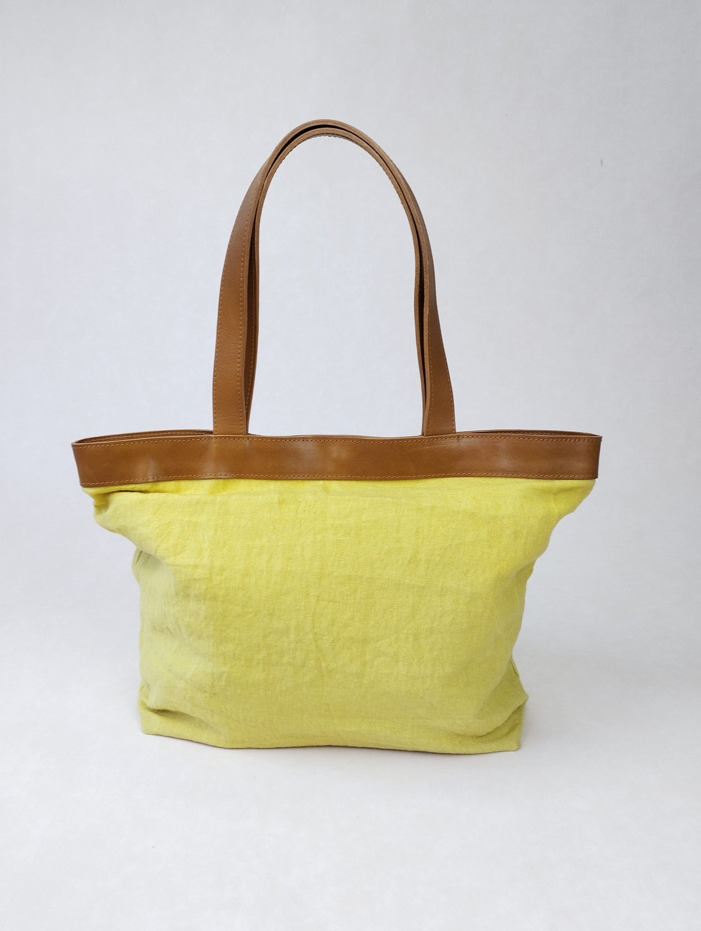 BOLSO ROMA AMARILLO ASAS COLOR CAMEL